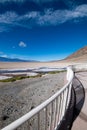 Curved white fence at Badwater Basin in Death Valley National Park