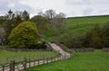 Curved Winding Roadway Through Rural Farmland in England Royalty Free Stock Photo