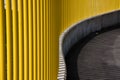 Curved Yellow Wall with posts Royalty Free Stock Photo