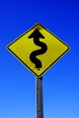 Curves Ahead Roadsign Road Sign Yellow on Blue Sky Royalty Free Stock Photo