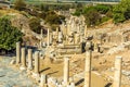 The curving, colonnaded Curetes Street winds down towards the Celsus Library in Ephesus, Turkey