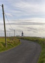 A curving Minor Irish Road leading to the Hook Lighthouse at Hook Point in County Wexford.