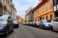 old classic narrow street alley in Budapest. parked cars along the sidewalk. old houses. Royalty Free Stock Photo