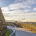 Curving path and arched bridge over Oquirrh Lake Royalty Free Stock Photo