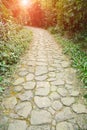 Curving stone pavement footpath