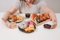 Curvy female preparing to eat hamburger, overeating problem, depression Royalty Free Stock Photo