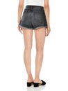 Curvy fit mid roll denim shorts for women paired with sneakers with white background