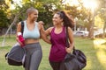 Curvy friends walking home after fitness exercise Royalty Free Stock Photo