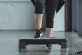 Curvy girl exercising on step platform Royalty Free Stock Photo