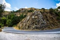 Curvy mountain road in Mediterranean mountains Royalty Free Stock Photo