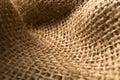 Curvy natural linen fabric texture for background. Close up view Royalty Free Stock Photo