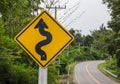 Curvy road sign to the mountain Royalty Free Stock Photo