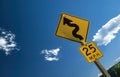 Curvy road, road sign in the USA Royalty Free Stock Photo