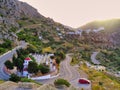 curvy street in greece with houses beside at sunset Royalty Free Stock Photo