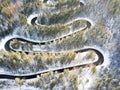 Curvy windy road in snow covered forest Royalty Free Stock Photo