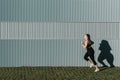 Curvy young athletic woman running Royalty Free Stock Photo