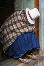 Cusco, Peru - AUGUST 31 2019: Indigenous senior woman sleeping at