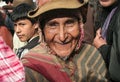 Old Peruvian man happily smiling with wrinkled face