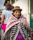 Old  quechua woman in traditional costum at street of  Cusco City, Peru Royalty Free Stock Photo