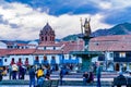 View of Plaza de Armas in Cusco in the evening with the statue of Pachacuti