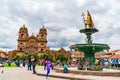 View of Plaza de Armas with The Statue of Pachacuti and The Cathedral Basilica of the Assumption of the Virgin in Peru Royalty Free Stock Photo
