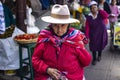 Old Peruvian woman with wrinkled face and poor clothing. Royalty Free Stock Photo