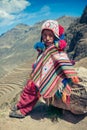 Cusco / Peru - May 29.2008: Portrait of a boy, dressed up in colorful native peruvian costume