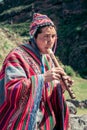 Cusco / Peru - May 29.2008: Portrait of a man, shepherd, goat herder, dressed up in native, peruvian costume Royalty Free Stock Photo