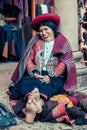 Cusco / Peru - May 26.2008: Portrait of a sewer woman, seamstress, dressed up in traditional native peruvian clothes.