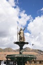 Image of Inka sculpture in Cusco main square. Peruvian city in the Andes. Golden sculpture. Royalty Free Stock Photo