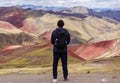 Cusco/Peru - Oct.03.19: boy admires the beautiful view on the Palccoyo rainbow mountains