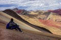 Cusco/Peru - Oct.03.19: boy admires the beautiful view on the Palccoyo rainbow mountains