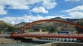 Cusco/Peru - Oct.03.19: tour bus crossing the steel bridge on the Peruvian road