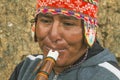 Cusco, PerÃÂº; December 20, 2018,Peruvian man playing the quena, musical instrument, closed shot, peru