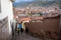 Cusco plaza from steep cobbled street