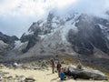 Cusco Province, Peru - May 8th, 2016: A young group of international hikers, led by their local Inca guide, navigate the Andes mo