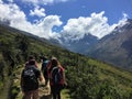 Cusco Province, Peru - May 8th, 2016: A young group of international hikers, led by their local Inca guide, navigate the Andes mo