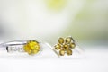 Cushion Cut Citrine Gemstone .yellow orange Round Cut and Diamond Ring.Placed on a beautiful light wood floor