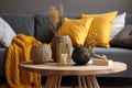 yellow pillow sofa home cushion house design interior modern grey decor. Generative AI. Royalty Free Stock Photo