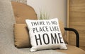 Cushions with a text There is no place like home. Stay home, work from home coronavirus prevention concept