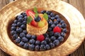 Custard filled vol-au-vent and fresh blueberries Royalty Free Stock Photo