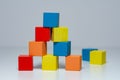 Building from wooden colourful childrens blocks Royalty Free Stock Photo