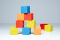 Building from wooden colourful childrens blocks Royalty Free Stock Photo