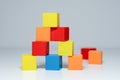 Building from wooden colourful childrens blocks Royalty Free Stock Photo