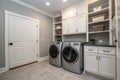 Custom laundry area with washer and dryer Royalty Free Stock Photo