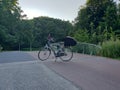 Custom electric delivery bycicle on a bridge