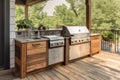 custom kitchen with built-in grilling station, fryer and warming drawer Royalty Free Stock Photo