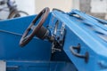 Custom made blue convertible car dashboard with wooden steering