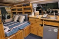 Custom made natural wooden interior of small camper van, made by Slovak company Caravan ZA