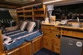 Custom made natural wooden interior of small camper van, made by Slovak company Caravan ZA